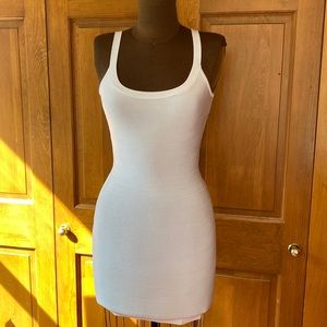 Marciano by GUESS. White bandage dress with lace up back